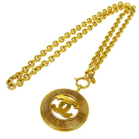 chanel necklace gold coin|Chanel necklace price list.